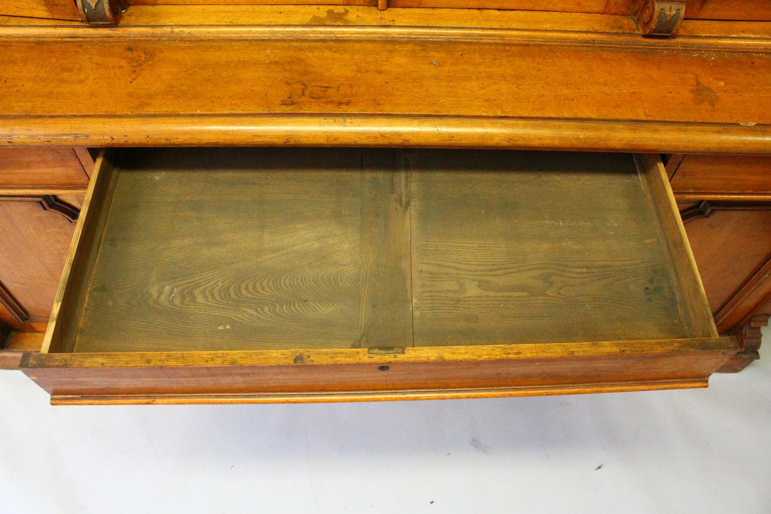 A VICTORIAN OAK LIBRARY BOOKCASE, with a moulded cornice above four glazed doors enclosing - Image 6 of 17