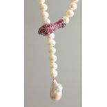 A SILVER RUBY SET SNAKE PEARL NECKLACE.