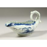 A LONGTON HALL BLUE AND WHITE COS LETTUCE SAUCEBOAT, CIRCA. 1756. 5.75ins long. Provenance: