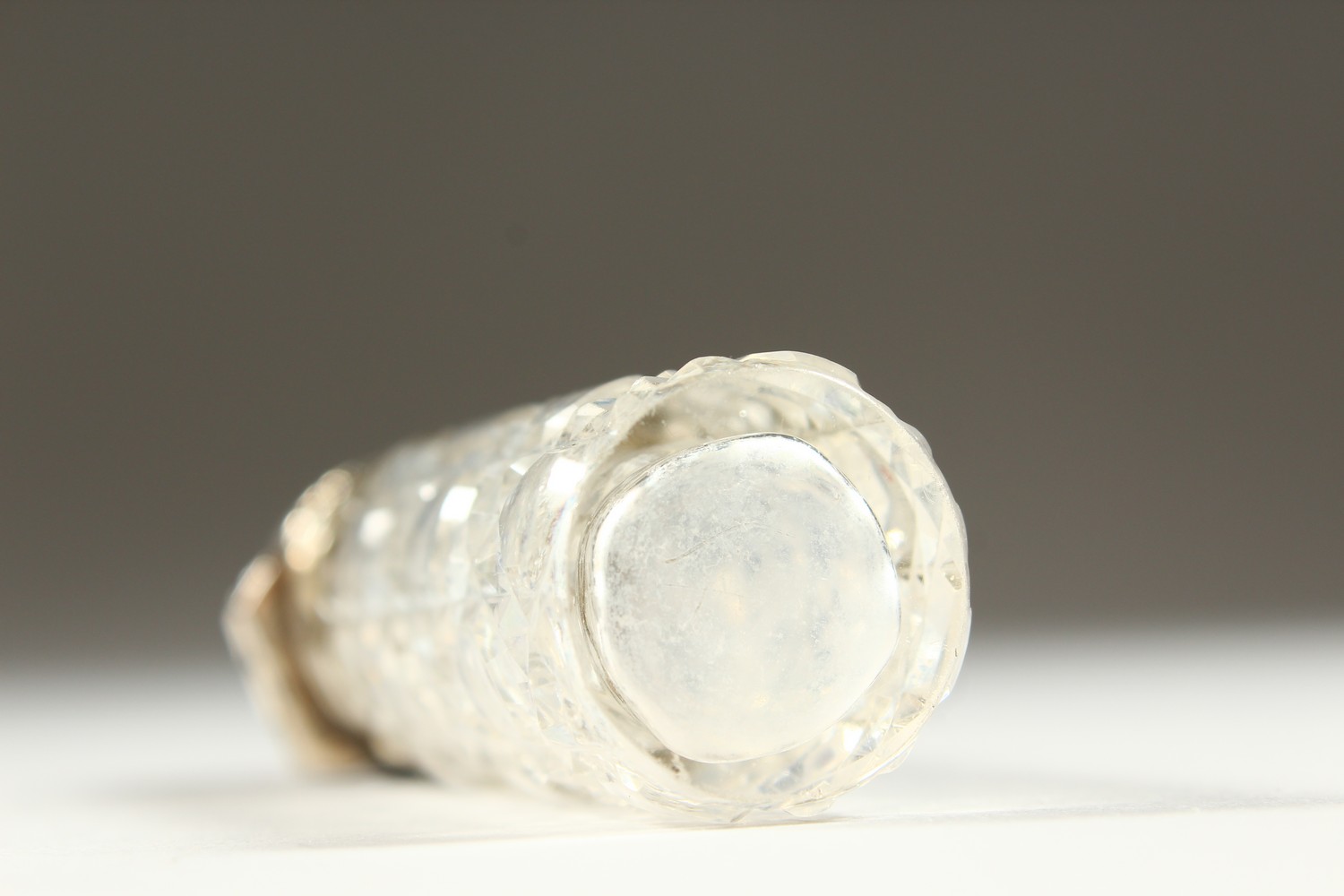 A VICTORIAN PLAIN CUT GLASS SCENT BOTTLE with repousse silver top and plain glass stopper. - Image 4 of 10