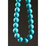 A LARGE STRING ON TURQUOISE STONES.