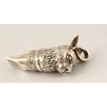 A SILVER RABBIT WHISTLE.