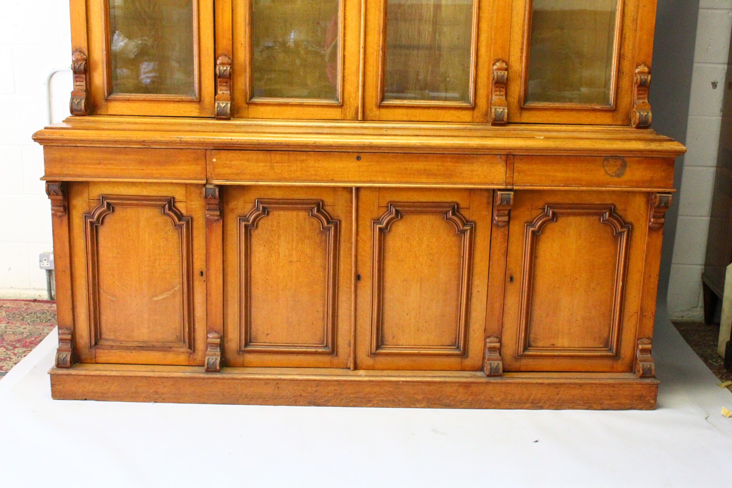 A VICTORIAN OAK LIBRARY BOOKCASE, with a moulded cornice above four glazed doors enclosing - Image 2 of 17