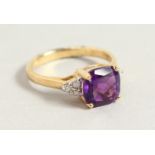 A 9CT GOLD, AMETHYST AND DIAMOND RING.