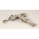 A SILVER PISTOL WHISTLE.