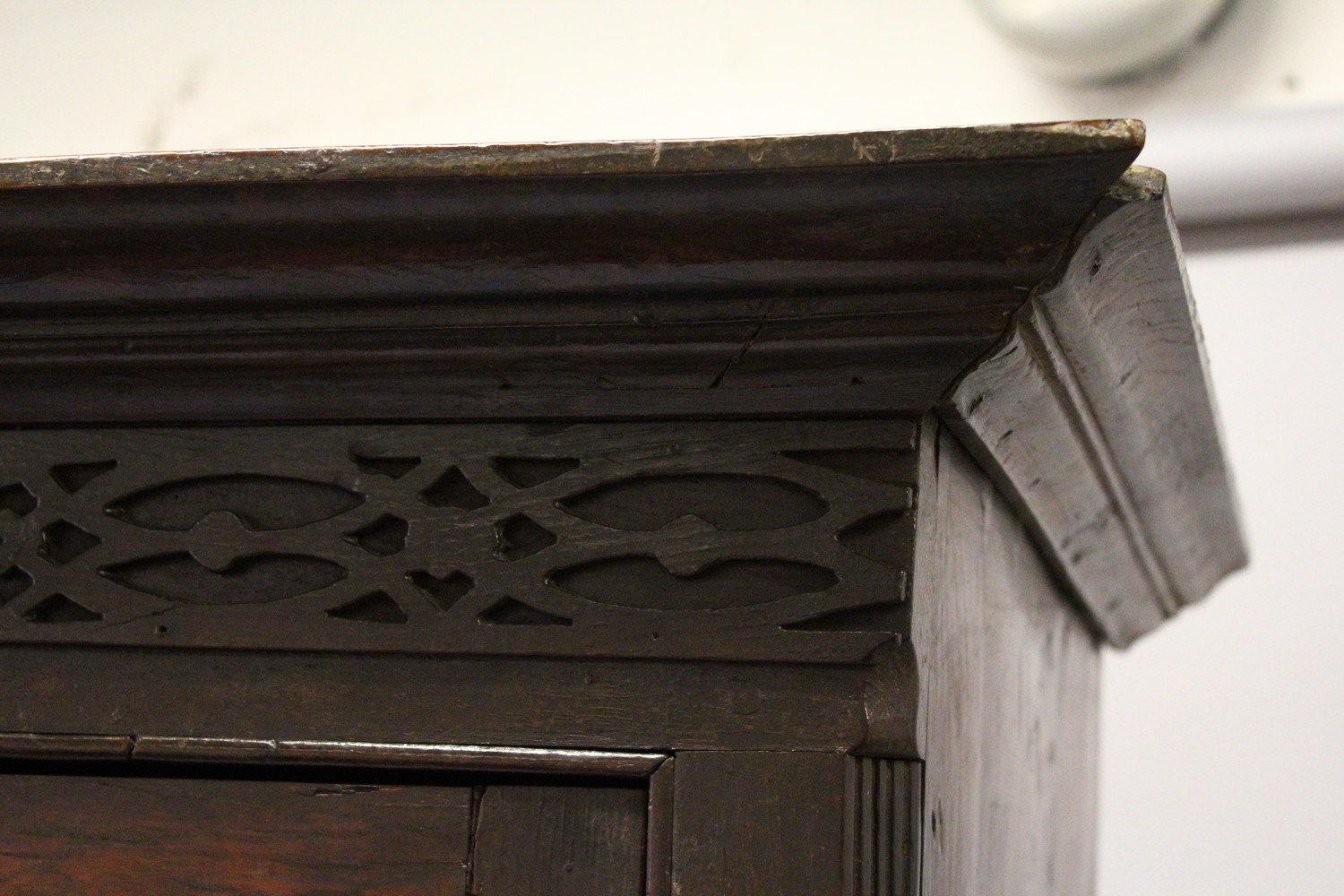 AN 18TH CENTURY OAK BACON CUPBOARD, with a moulded cornice, blind fret decorated frieze above a pair - Image 10 of 13