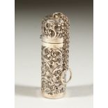 AN EDWARD VII SILVER SCENT BOTTLE with floral repousse decoration, scrolls and flowers with plain
