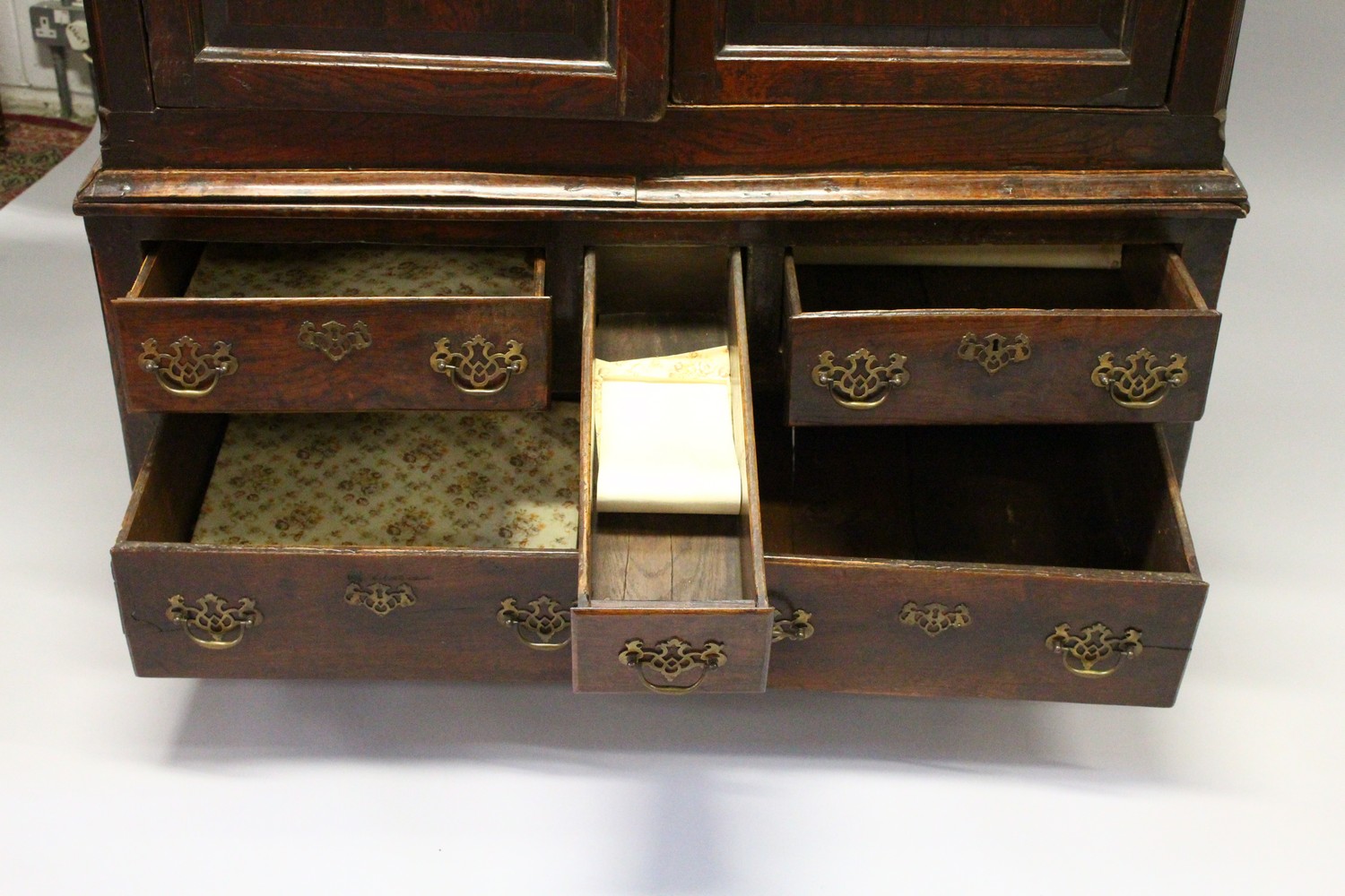 AN 18TH CENTURY OAK BACON CUPBOARD, with a moulded cornice, blind fret decorated frieze above a pair - Image 11 of 13