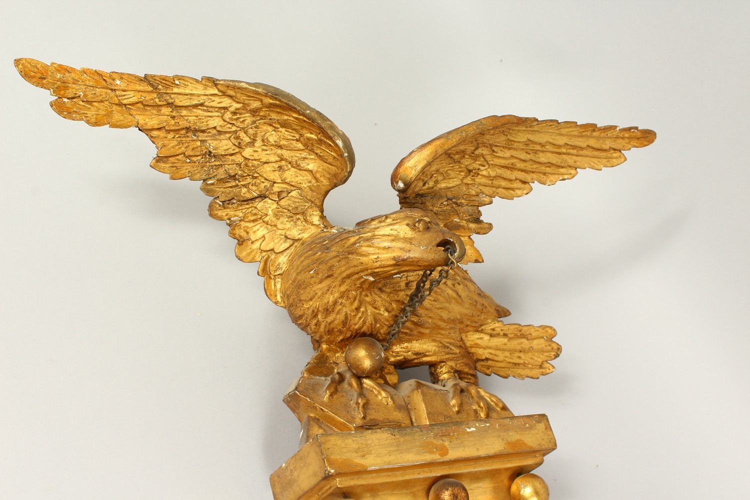 A REGENCY GILTWOOD CONVEX WALL MIRROR, with eagle cresting, ball applied frame, and leaf carved - Image 6 of 13