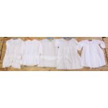 FIVE CHILD'S EDWARDIAN/VICTORIAN COTTON DRESSES/TOPS, some with lace embellishments.