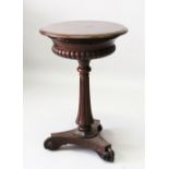 AN EARLY 19TH CENTURY ROSEWOOD PEDESTAL WORK TABLE, with circular rising top, tapering column