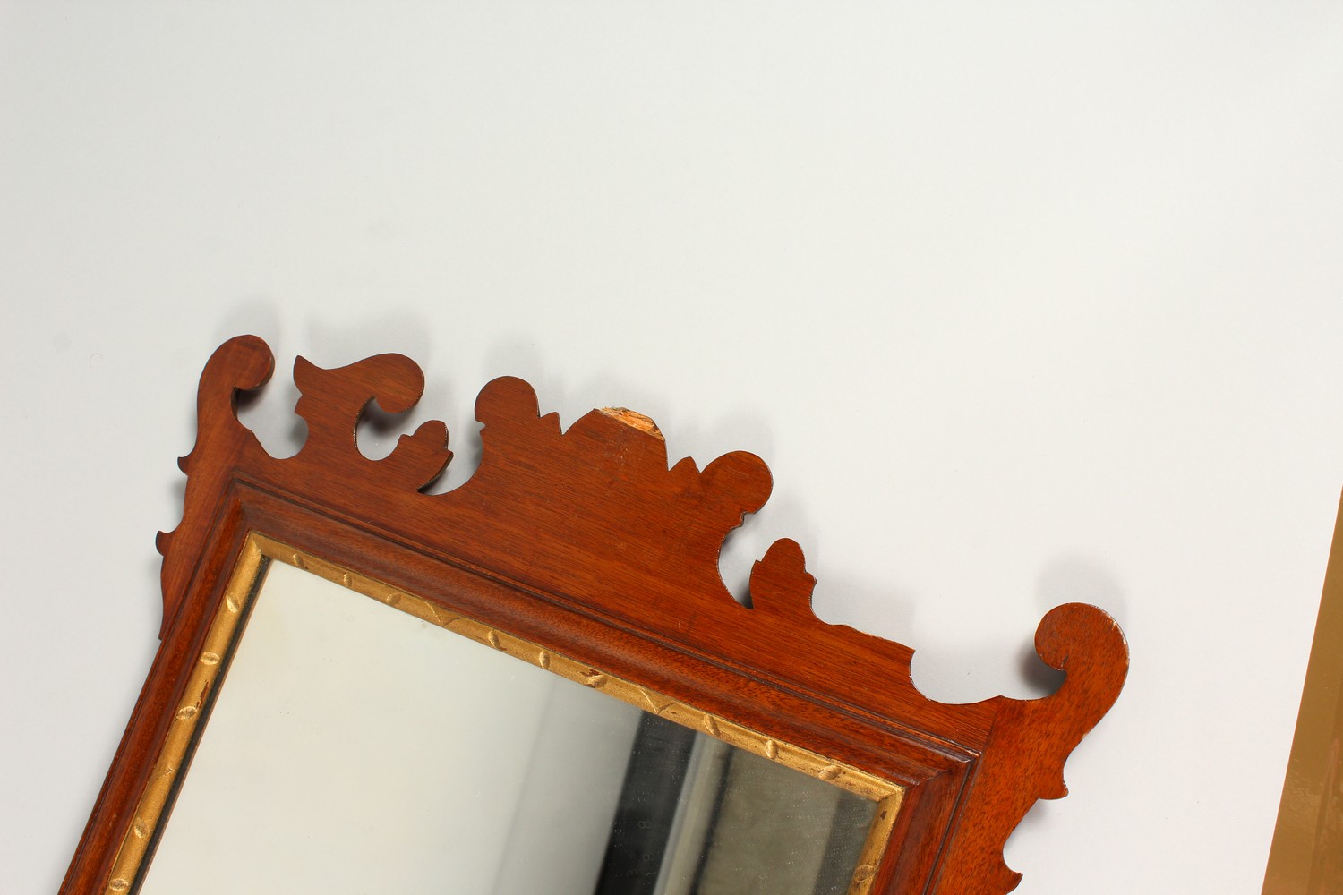 A GEORGE III STYLE MAHOGANY FRETWORK FRAMED WALL MIRROR. 70cms high x 44cms wide. - Image 3 of 8