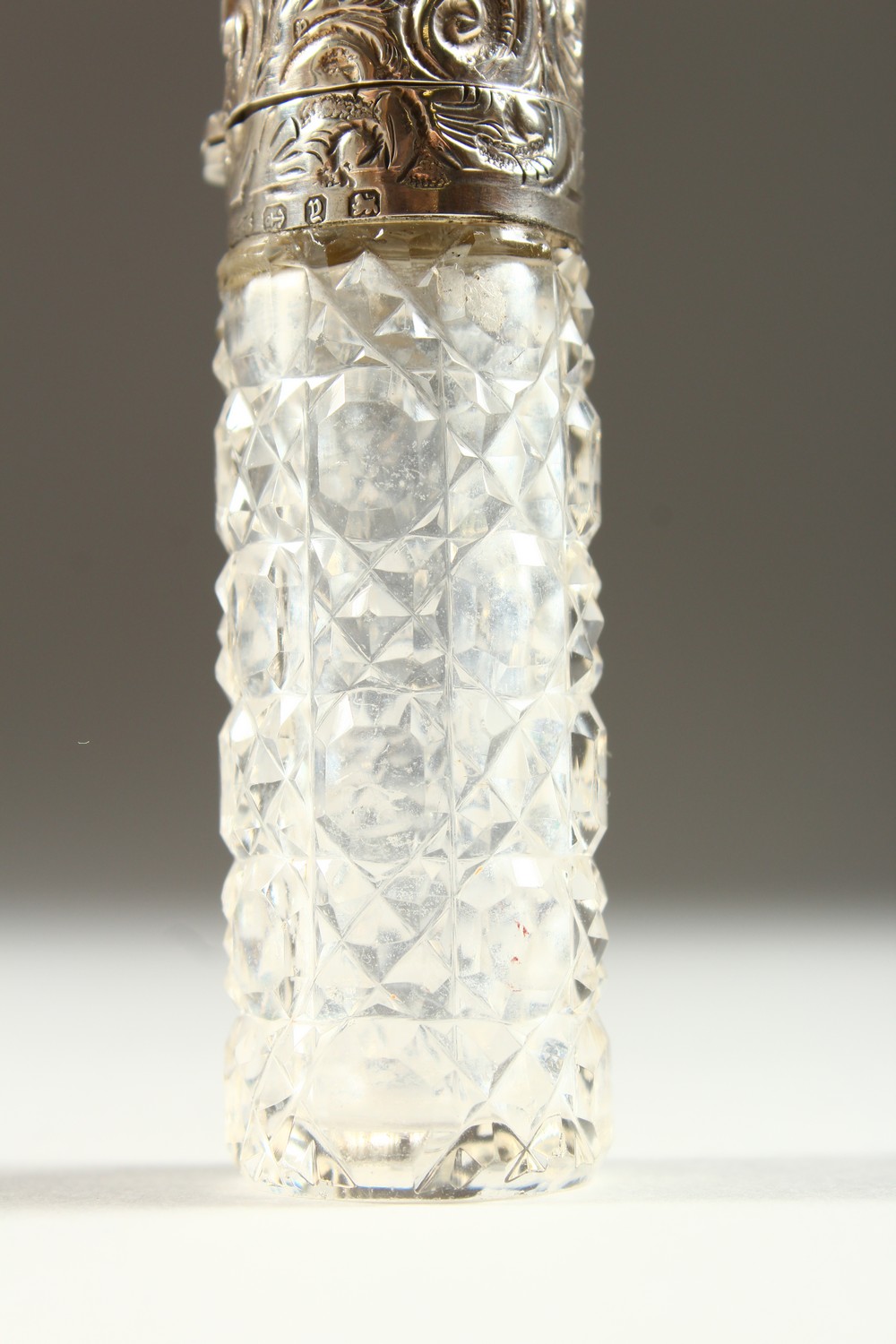 A VICTORIAN PLAIN CUT GLASS SCENT BOTTLE with repousse silver top and plain glass stopper. - Image 2 of 10
