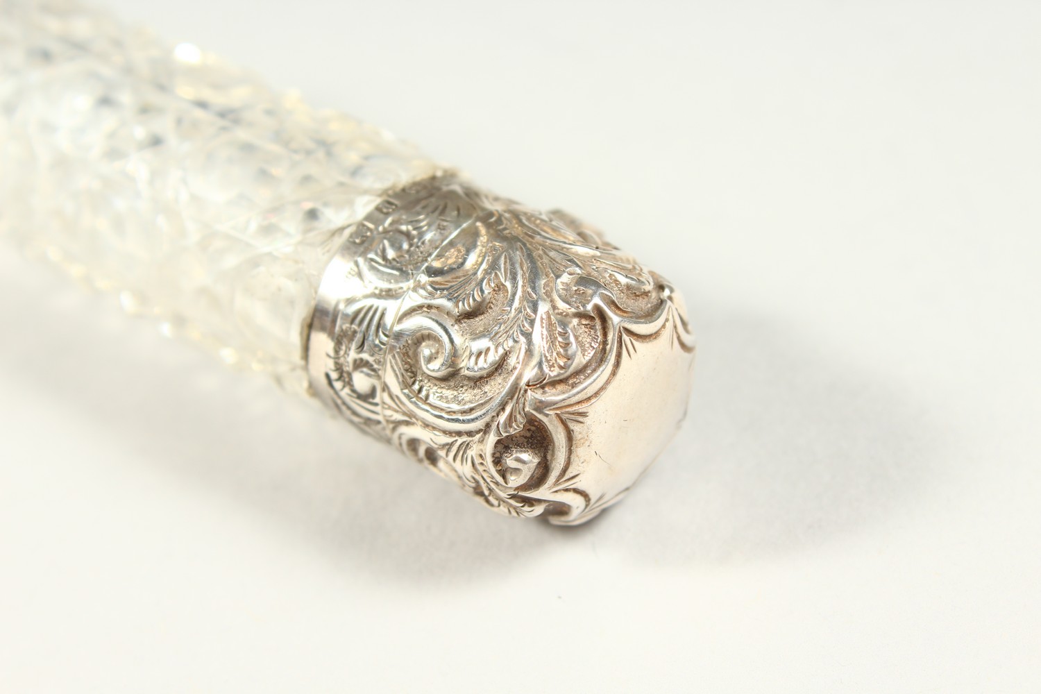 A VICTORIAN PLAIN CUT GLASS SCENT BOTTLE with repousse silver top and plain glass stopper. - Image 6 of 10