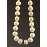 A PEARL NECKLACE, interspersed with small diamonds. 42cms long.