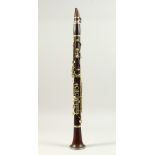 A WOODEN CLARINET. (AF) 63cms long.