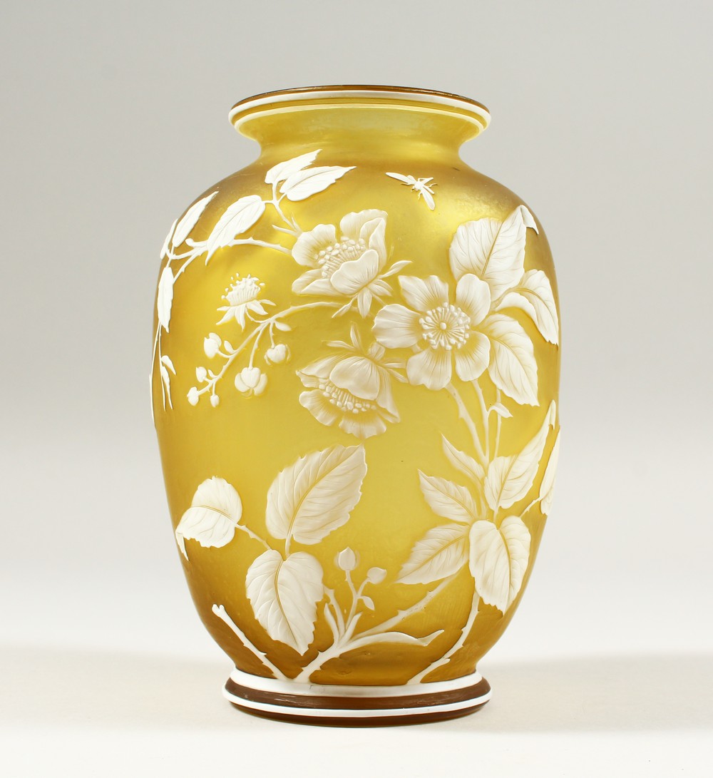 A GOOD YELLOW AND WHITE CAMEO GLASS VASE, with flowers and insects. 7ins high.