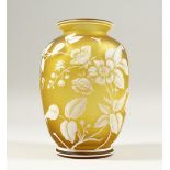 A GOOD YELLOW AND WHITE CAMEO GLASS VASE, with flowers and insects. 7ins high.