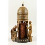A VIENNA STYLE COLD PAINTED BRONZE MODEL OF ARAB FIGURES BY A TOWER. 31cms high.