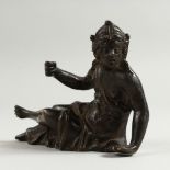 A SMALL BRONZE SEATED FIGURE, POSSIBLY 17TH CENTURY. 12cms long.