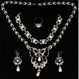 A SILVER .925 DIAMOND AND PEARL PASTE NECKLACE, EARRINGS AND RING.
