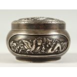 A CAST METAL CENSER, the top pierced with dragon design. 10cms diameter.