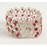 A VERY GOOD QUALITY SILVER AND RUBY WIDE BRACELET.