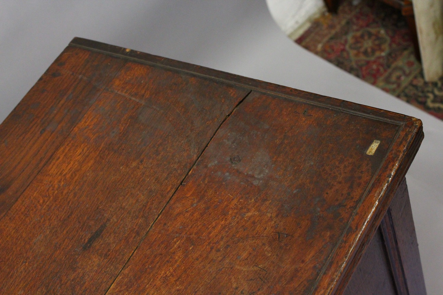 A 19TH CENTURY OAK COFFER BACK, with a plain plank top, triple panel front and two drawers, on - Image 4 of 11