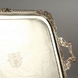 A GOOD LARGE TWIN-HANDLED TRAY, with a gadroon border, the corners cast with a shell, acorn and