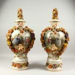 A GOOD PAIR OF MEISSEN DESIGN BULBOUS VASES, COVERS AND STANDS encrusted with garlands of flowers