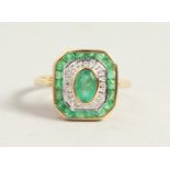 A 9CT GOLD, EMERALD AND DIAMOND DECO STYLE RING.