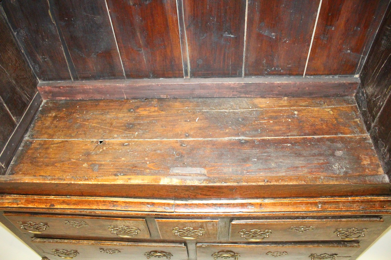 AN 18TH CENTURY OAK BACON CUPBOARD, with a moulded cornice, blind fret decorated frieze above a pair - Image 9 of 13