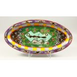 CLEMENTINA VAN DE WALT, a large lustre decorated and abstract painted oval dish (AF). 69cms long.