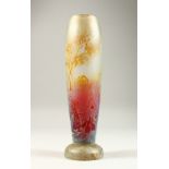 A LARGE ART NOUVEAU GLASS VASE, painted with a Dutch woman and geese in a roadway. 14ins high.
