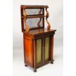 A SMALL REGENCY ROSEWOOD CHIFFONIER, with pierced gallery, two mirror back shelves with scrolling