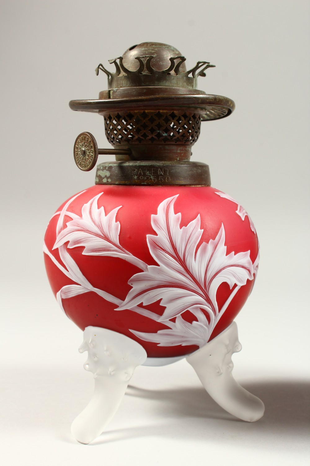 A PAIR OF RED AND WHITE CAMEO GLASS OIL LAMP BASES, with flowers, leaves and thistles. 7.5ins high. - Image 4 of 13