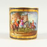 A SEVRES CUP, painted with figures and horses at an encampment.