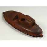 A SMALL PAPUA NEW GUINEA CARVED WOOD MASK. 26cms high.