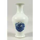 A SMALL BLUE AND WHITE BALUSTER SHAPE VASE. 20cms high.