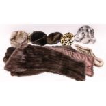 A COLLECTION OF FURS, comprising four stoles, four hats and a leopard print hat.