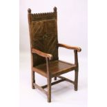 AN 18TH CENTURY AND LATER OAK GOTHIC ARMCHAIR, with pierced and carved cresting, tongue and groove