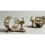 A PAIR OF AUSTRALIAN THEMED PLATED NAPKIN RINGS. 7cms wide.