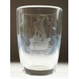 AN ORREFORS GLASS VASE, engraved with a galleon. 18cms high.