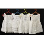 FOUR CHILD'S EDWARDIAN/VICTORIAN COTTON PINAFORE DAY DRESSES with BRODERIE ANGLAISE.