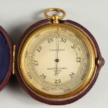 A NEGRETTI & ZAMBRA POCKET BAROMETER, in a leather case. 7cms diameter.