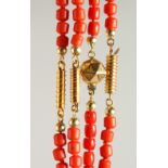 Four single-row coral necklaces. One with a 14K gold clasp stamped "G (flower-head) 585"