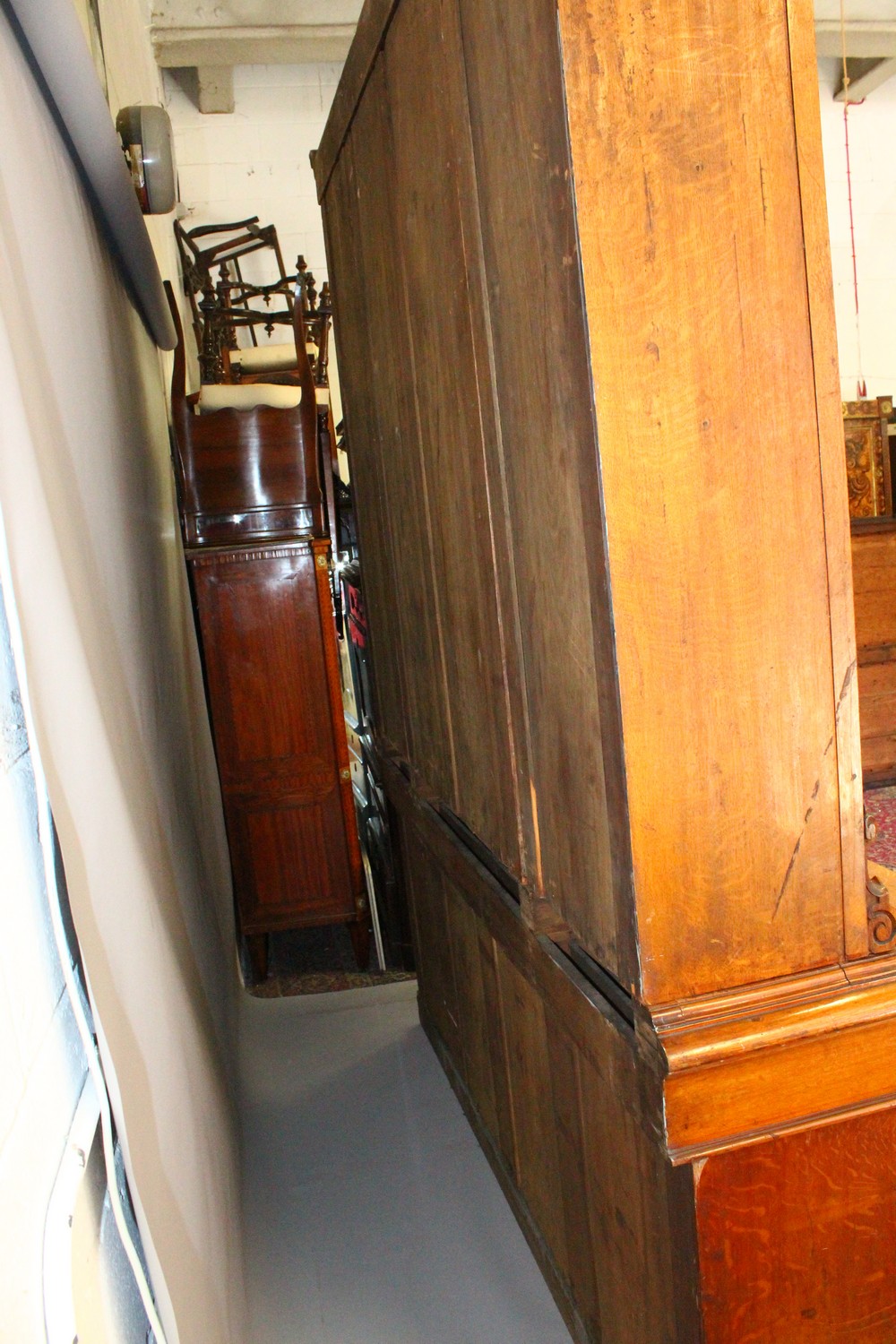 A VICTORIAN OAK LIBRARY BOOKCASE, with a moulded cornice above four glazed doors enclosing - Image 5 of 17