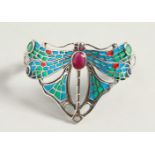 A SILVER, RUBY, EMERALD AND SAPPHIRE DRAGONFLY BROOCH.