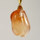 A 14CT GOLD PENDANT as a fruit.