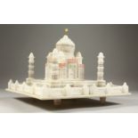 A CARVED AND PAINTED ALABASTER MODEL OF THE TAJ MAHAL. 30cms x 30cms.